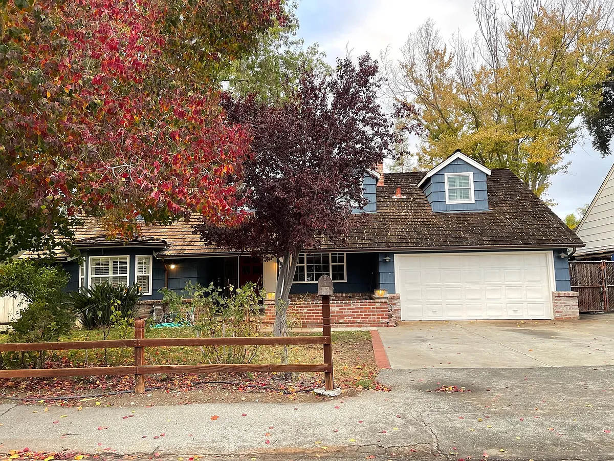 Photos from before current occupancy. Lovely expanded Cape Code style home. - 1473 Ben Roe Dr