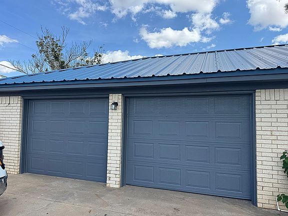 Two car attached garage. 