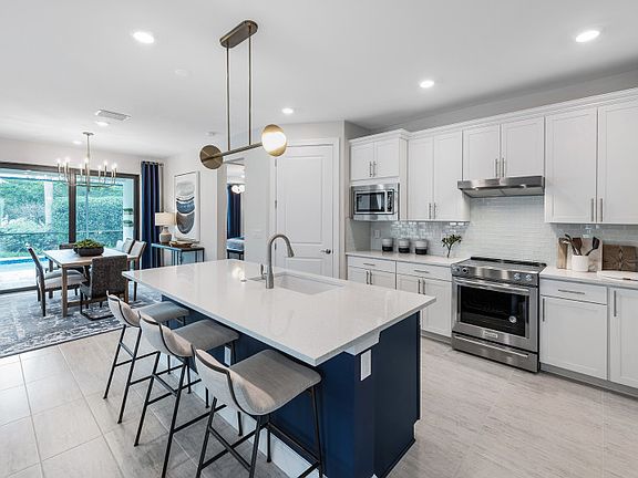 Kitchen with center island and stainless steel appliances