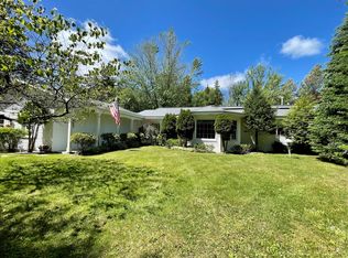 7134 Village Ln, Mullett Lake, MI 49761
