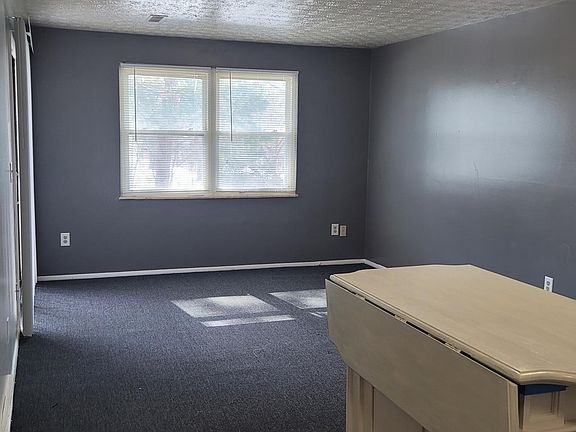 Newly painted and carpeted living room!
