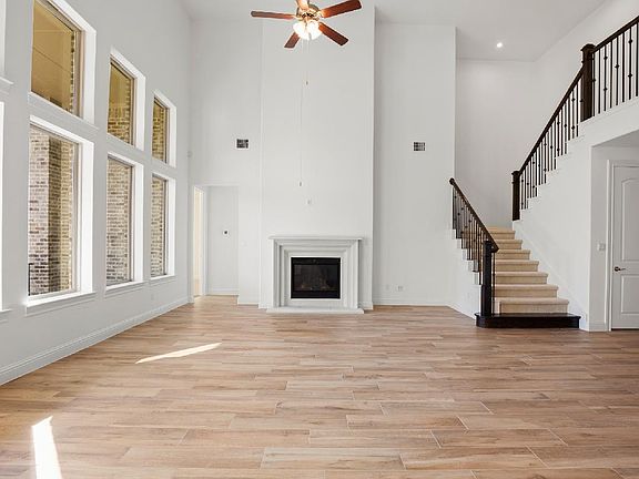 Great room features fireplace