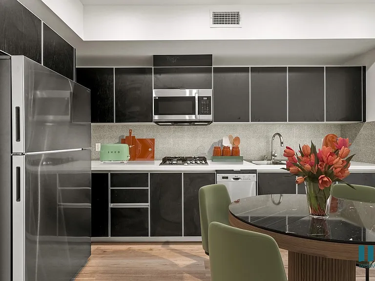 Open-Concept Kitchen with Stainless-Steel Appliances and Ample Cabinet Storage - Chestnut Floor Plan