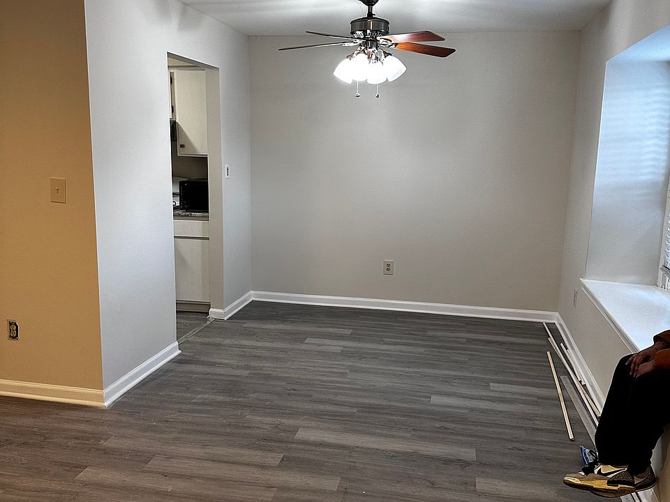 living room with large window for outside view