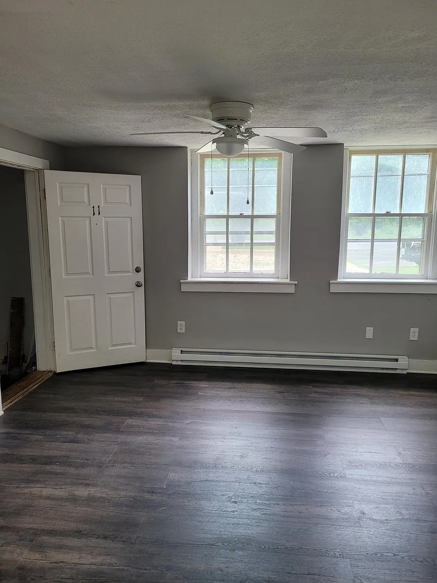 Entrance into Unit 11 Hardwood flooring- Private Entrance - Beautiful Windows to allow in lots of natural light - 60 E Railroad Ave