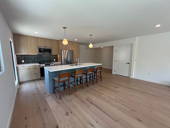 View from living room toward kitchen and dining nook