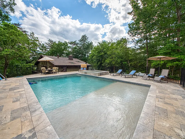 Pool with travertine.