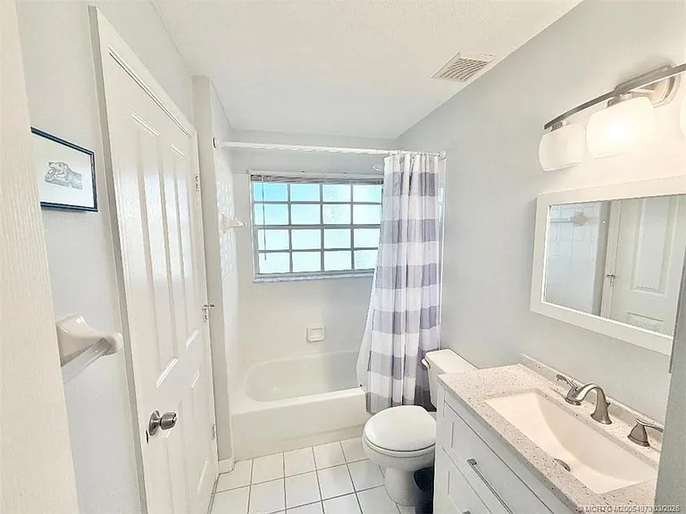 3486 SW Pindo Palm Ln — Photo 22