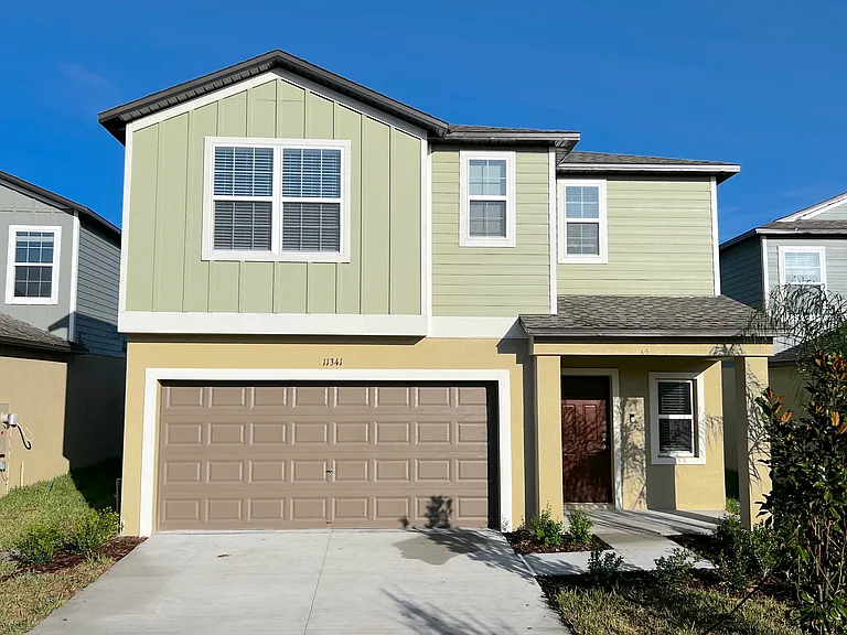 Two Card Garage with Long driveway