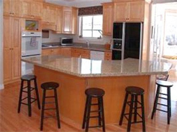 kitchen and oversized granite island