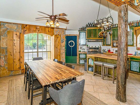 Shared kitchen, attached garage/laundry through door