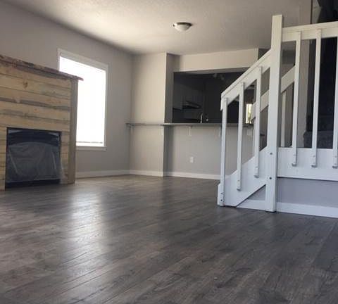 View as you enter the front door - main living room, stairs to the bedrooms and kitchen in the back.