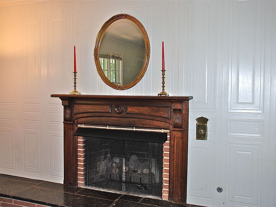 Custom paneled fireplace surround