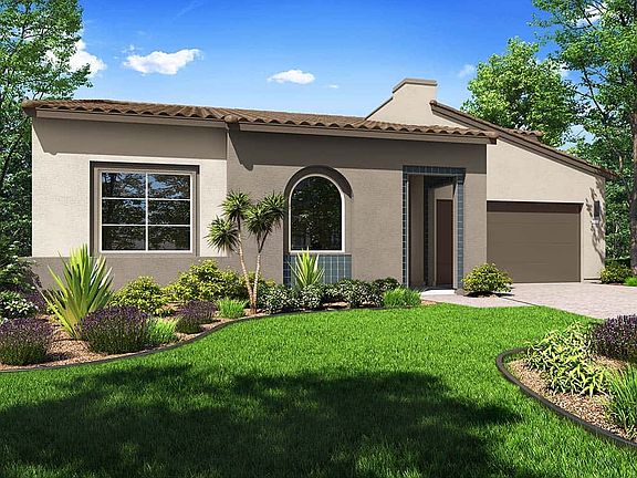 Elevation A features the spanish exterior style. Shown with Optional Golf Cart Garage