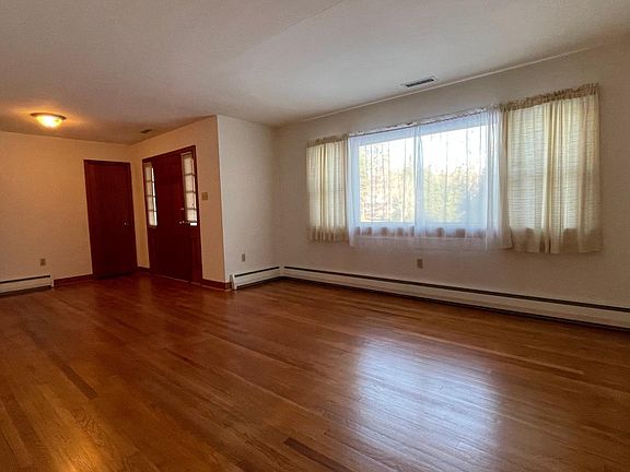 Living Room. Gleaming Hardwoods!
