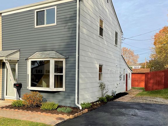 Front and side of house view into backyard