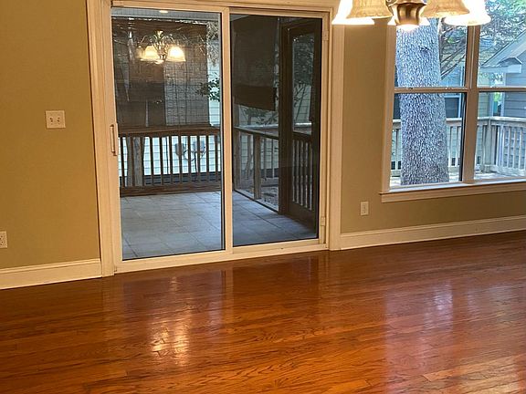 Dining Room facing Screened Porch and deck.
