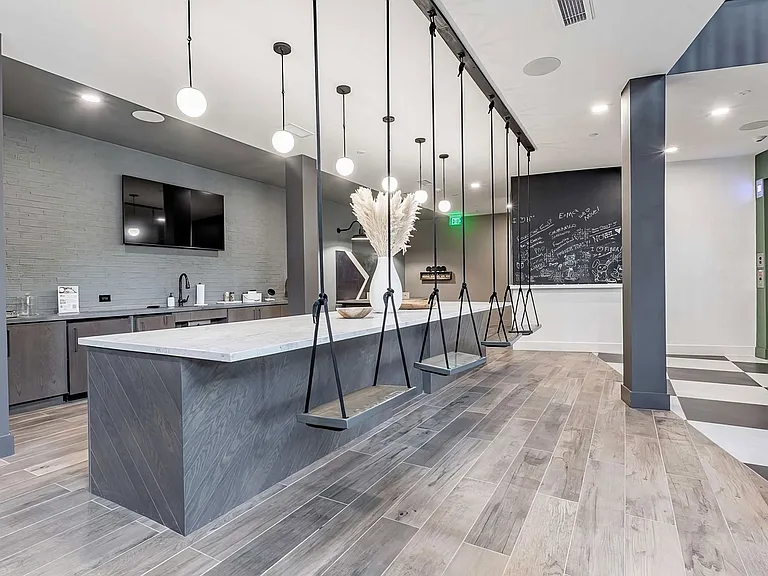 Counter area with interior swing seating, full wet bar, and chalkboard