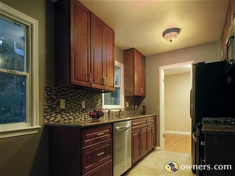 Newly renovated kitchen with stainless appliances, new flooring