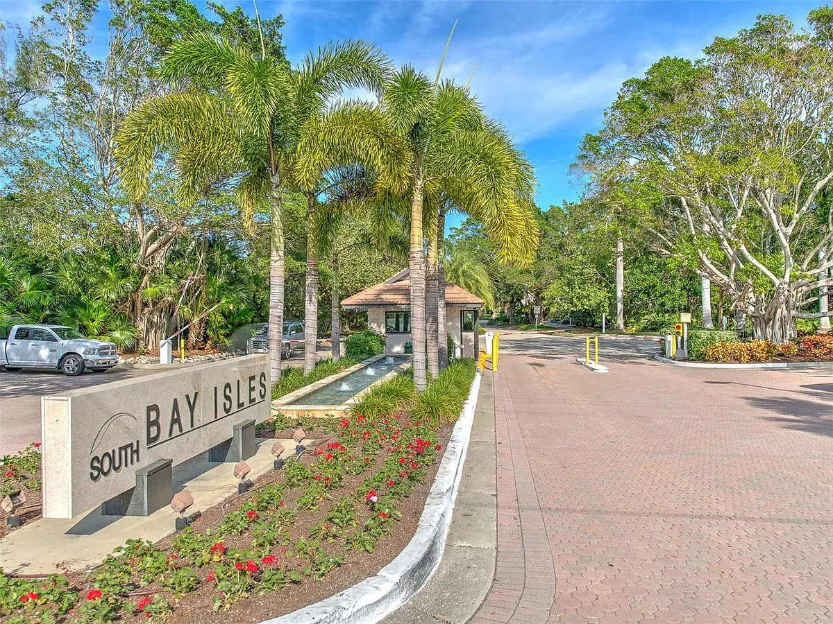 Photo 2 of 60 - 2377 Harbour Oaks Dr - Longboat Key, FL Building Photo - 2377 Harbour Oaks Dr