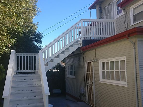Kitchen entrance (under white steps)