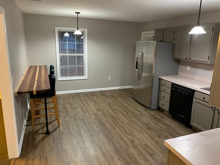 Spacious kitchen diner with breakfast bar.