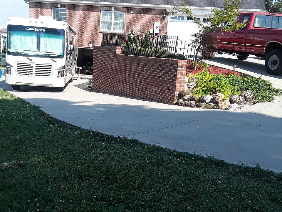 Driveway to both garages