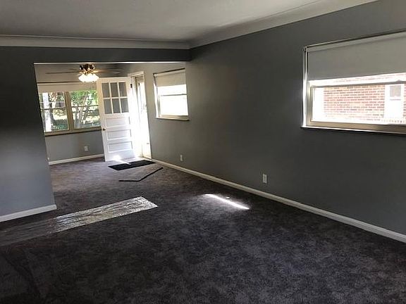 Bottom floor living room with outside entrance