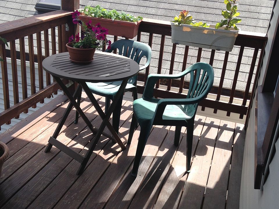 Balcony in the back - off the kitchen on the 2nd floor - plenty of space for a table & chairs, grill, and planters