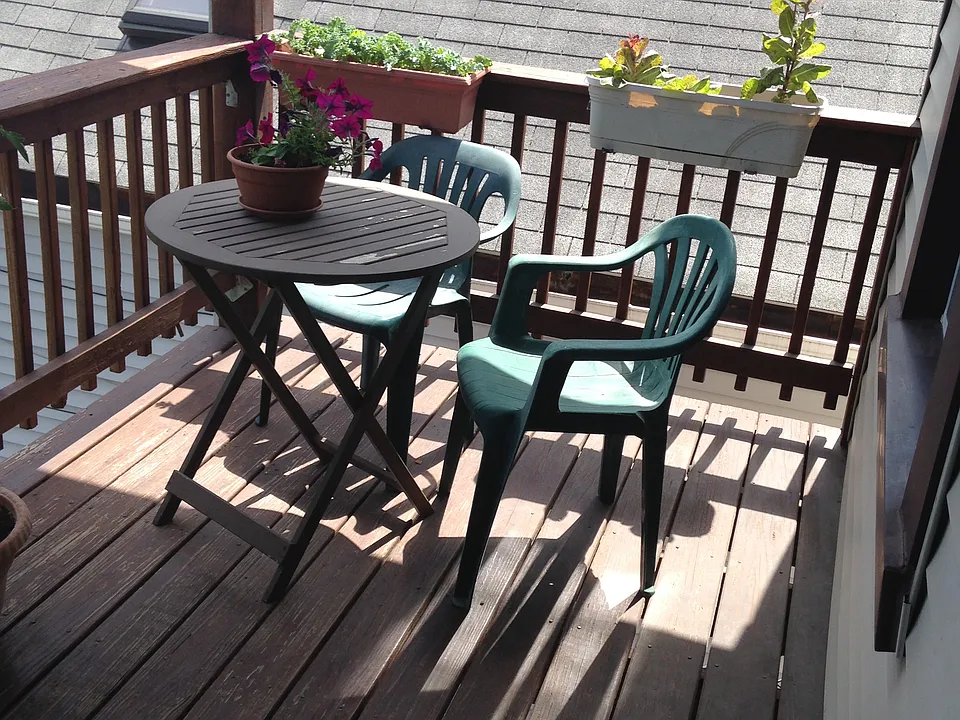 Balcony in the back - off the kitchen on the 2nd floor - plenty of space for a table & chairs, grill, and planters