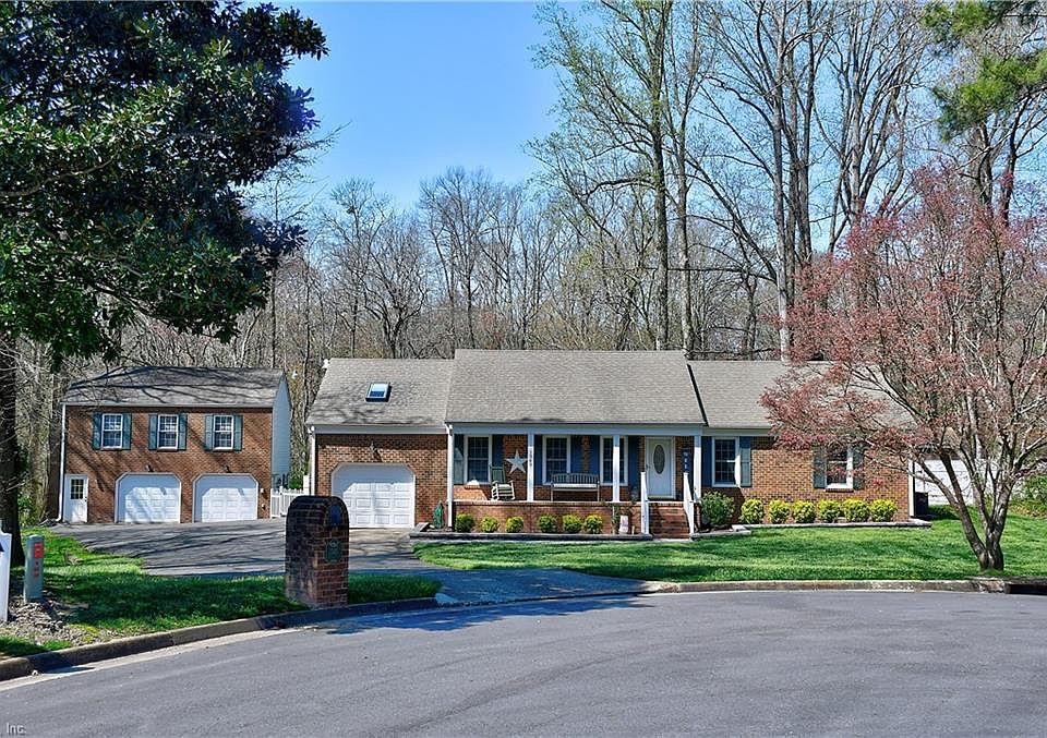 Fabulous brick ranch (with FROG) and detached 2 car garage with garage apartment upstairs in a cul de sac on 4.22 acres.