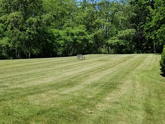 Spacious rear lawn area.