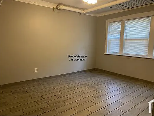 6059 S Troy St #G — Photo 1