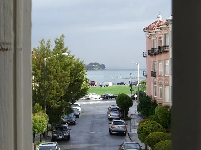 View looking out living room window. (See nature from your windows, not a wall!).