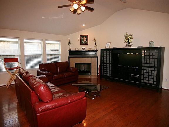 Beautiful HARDWOOD Floors in this spacious family room.  Lot's of windows to let the sunshine in.