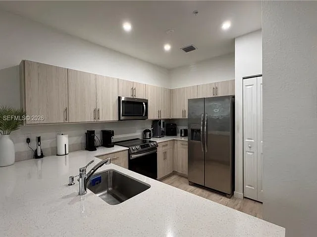 15540 SW 136th St — Photo 7