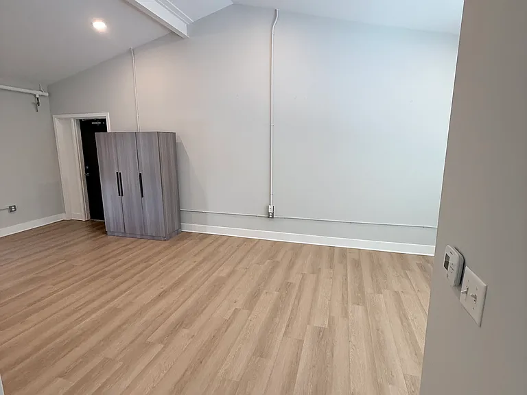 Additional view of living area, bonus wardrobe left by previous tenant