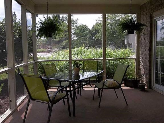 Porch. Relaxing screened porch completely remodeled with new screens, door and paint.