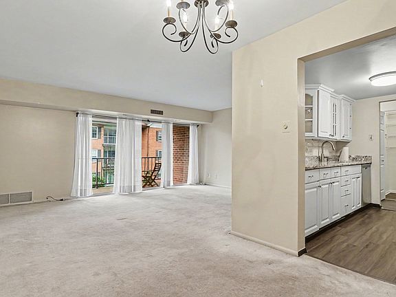 Living/Dining combo, opens to the kitchen