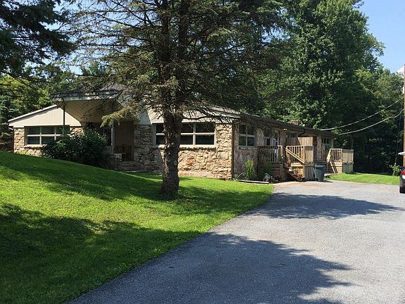 front of building , right corner Apt #1 with side deck