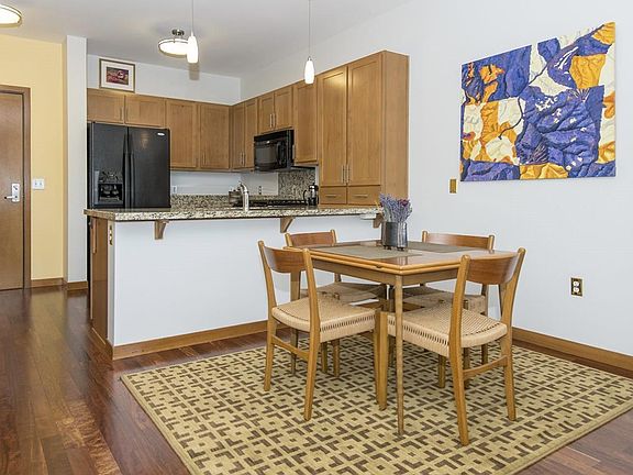 Kitchen view from living area (*old image with older appliances)