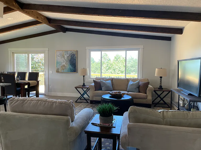 Living room is open to kitchen and dining area