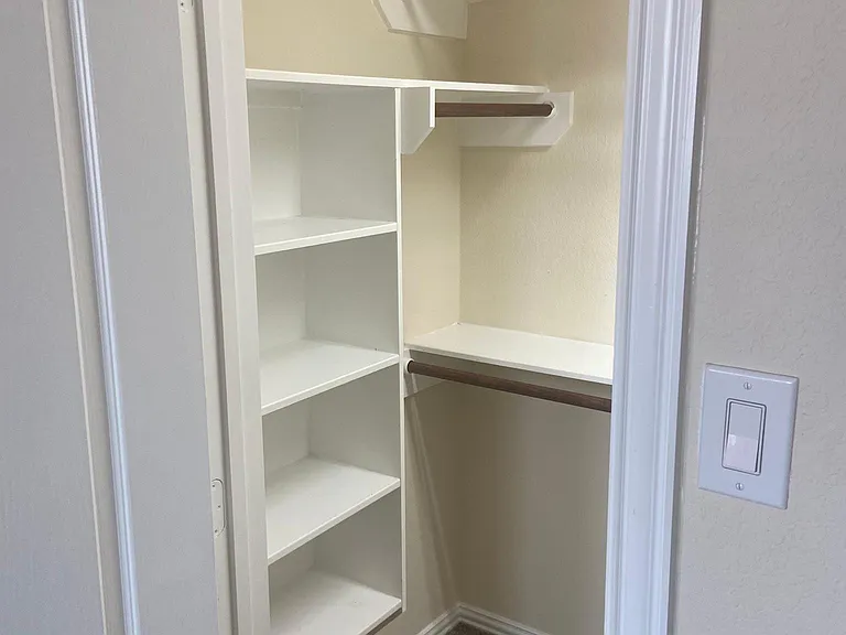 Second view of the second closet in master bedroom