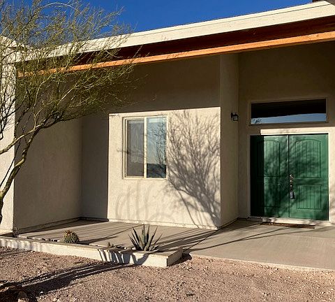 Front covered porch with planter