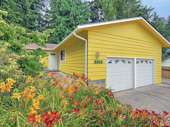 Beautifully maintained landscaping throughout the front and back yard add to the curb appeal of this great home!