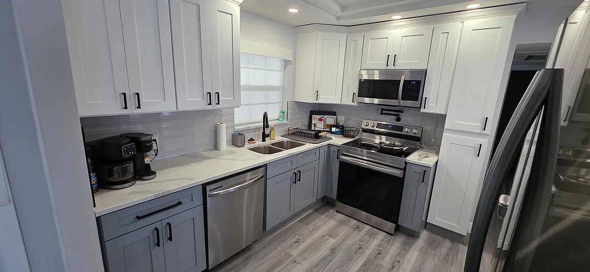 Kitchen - stocked with pots, pans, plates, glassware, mugs, keurig, instapot, cutting boards, cutlery, cooking utensils - 5425 36th Ave N