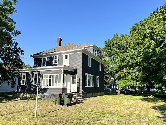 Exterior rear entrance with porch.