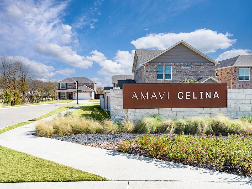 A distinctive community entry framed by landscaped greens and sidewalks, offering a warm first impression of this single-family neighborhood in Celina.