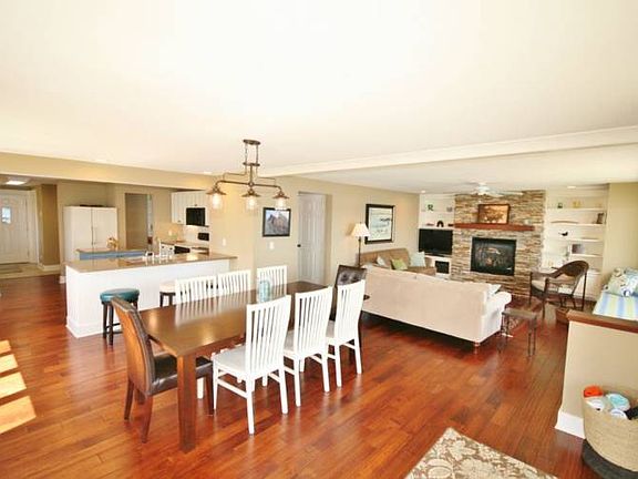 Todays family can gather in three main parts of this home. Recently remodeled, the living room, kitchen and dining room all share this open concept. You can't help but notice hand scraped wood floors that carry throughout most of the first floor.