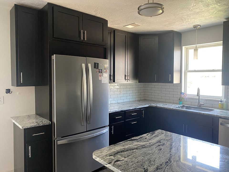 All new - Stainless appliances, granite tops, sleek backsplash, luxury vinyl flooring